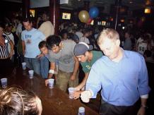 Beer lovers play Flip Cup