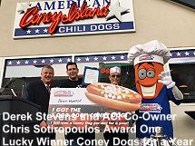 Derek Stevens and ACI Co owner Chris Sotiropoulos award Coney dogs for a year