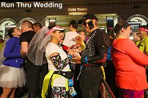 Geico Marathon run thru wedding