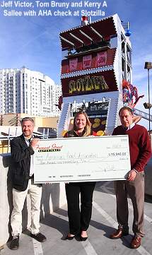 Jeff Victor, Tom Bruny and Kerry Sallee with AHA check at Slotzilla