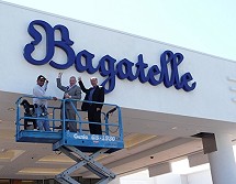 Jonathan Segal Tom Recine in Front of Bagatelle Sign at New Tropicana