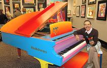 Peter Max at the Piano which he painted