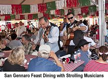 San Gennaro Feast dining with strolling musicians