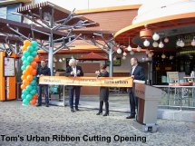 Tom's Urban ribbon cutting opening