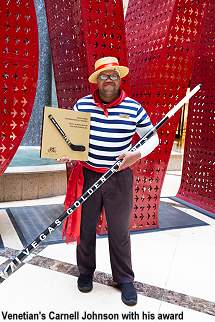 Venetian Carnell Johnson with award